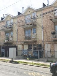 Vacant Multifamily Walk-Up Brick Building