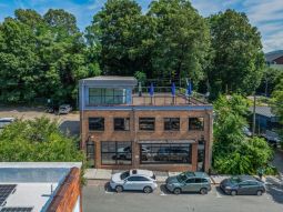 Turnkey Commercial Building in Downtown AVL!