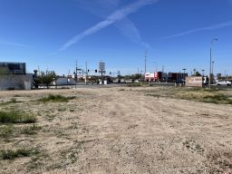 Half-Acre Vacant Lot Zoned C-2 Fully Improved